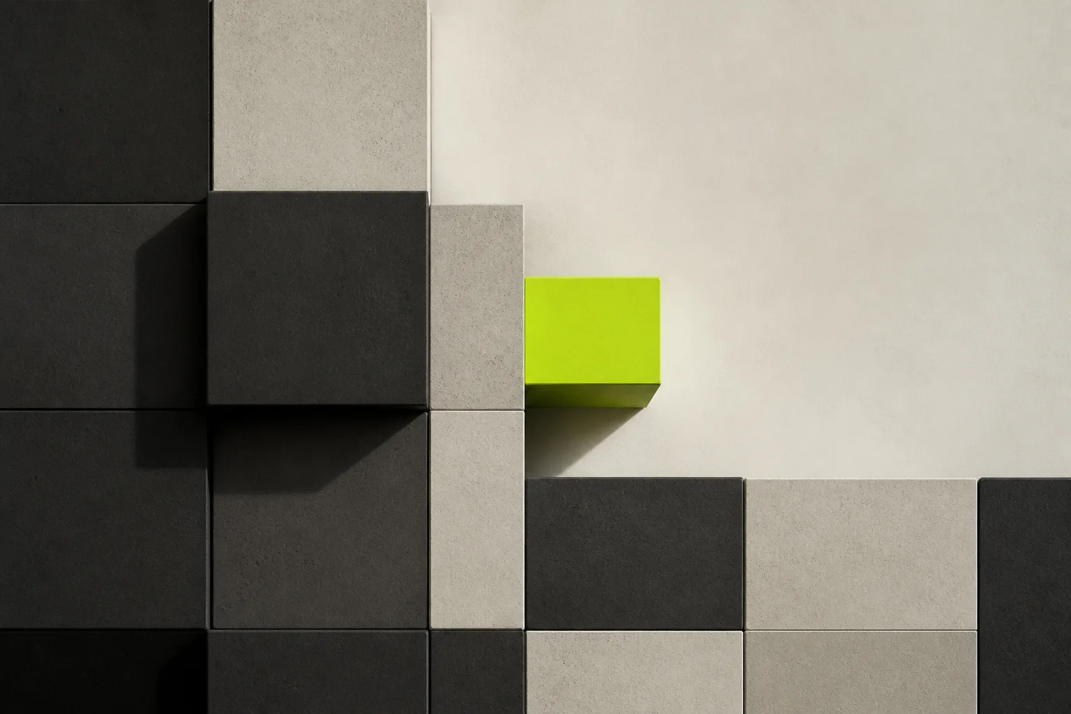 Abstract grid with one bright block offset from aligned muted blocks.